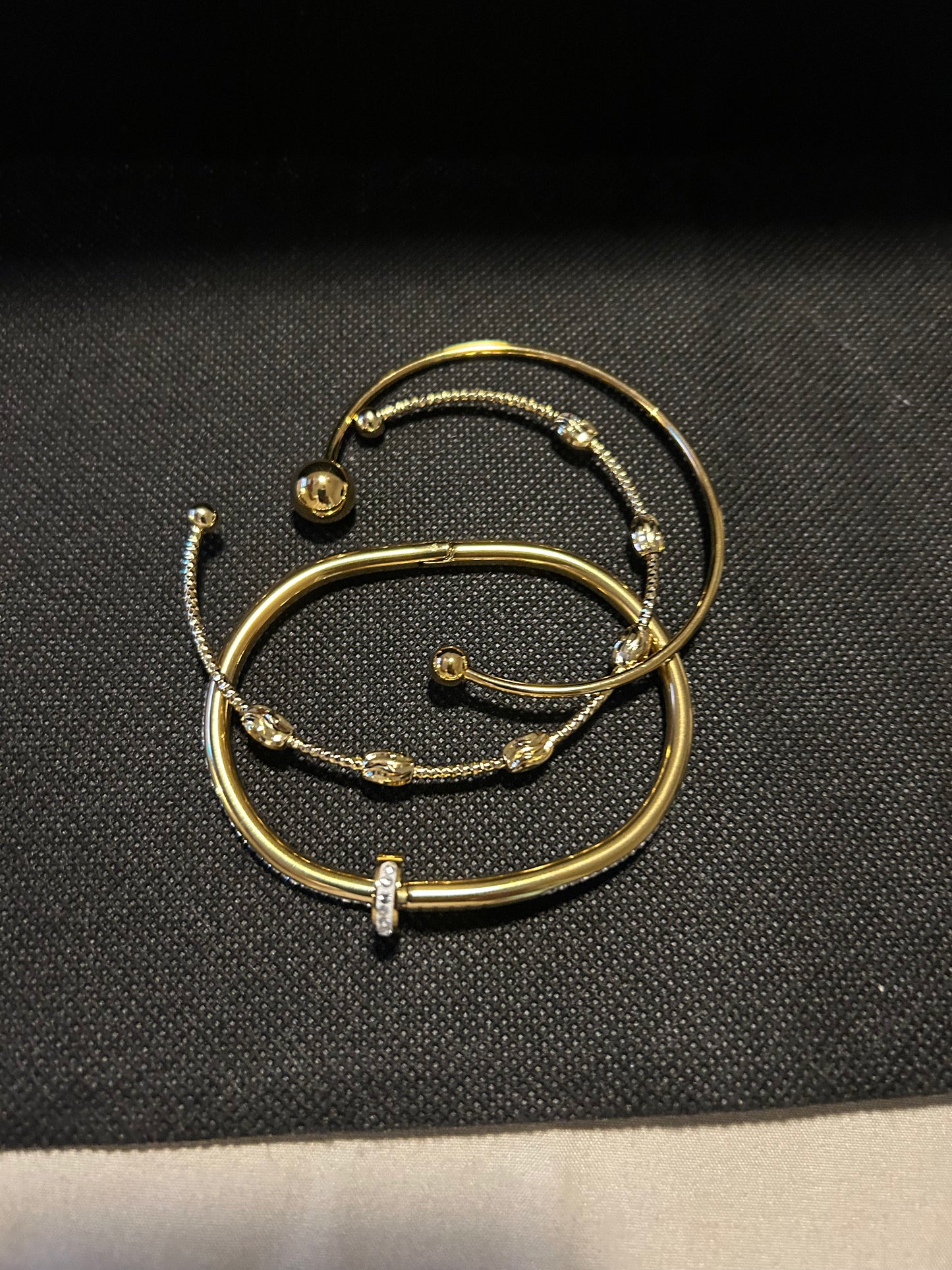 Gold nail stack bracelet